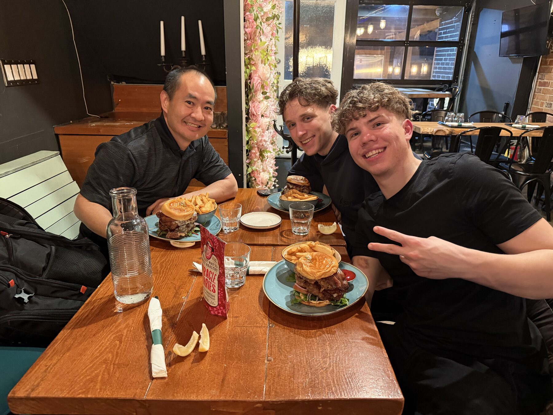 Leo Pohlmann, Leonard Rast and Dennis Yu at dinner in Toronto